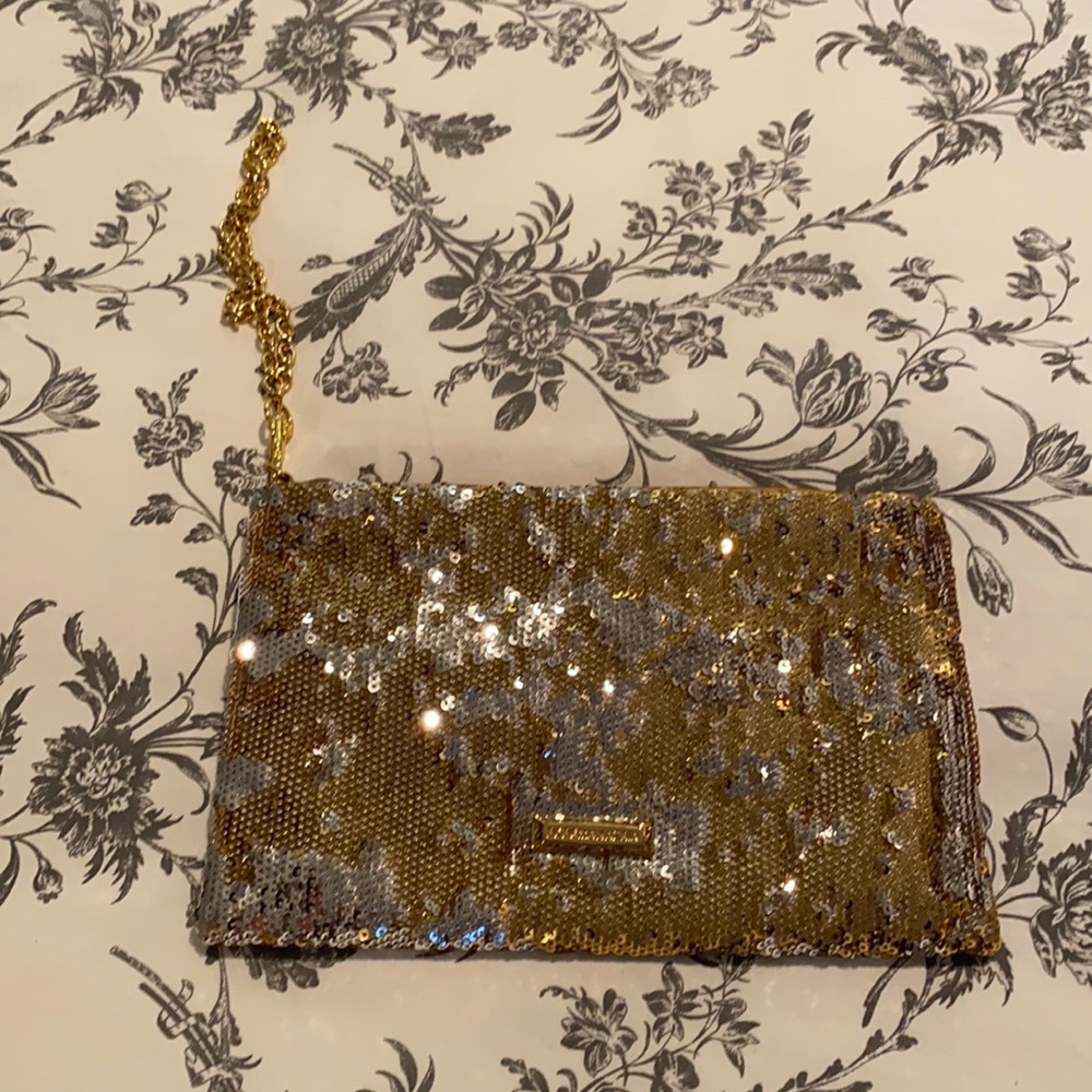 BCBG gold sequence wristlet. With tags